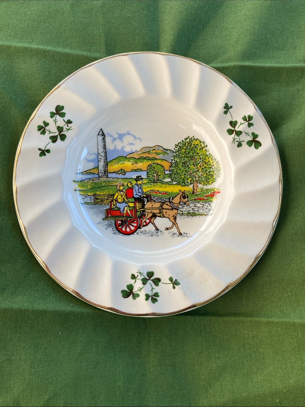 Carrigdhoun White Porcelain Plate with Green Shamrocks and Colorful Cart Scene